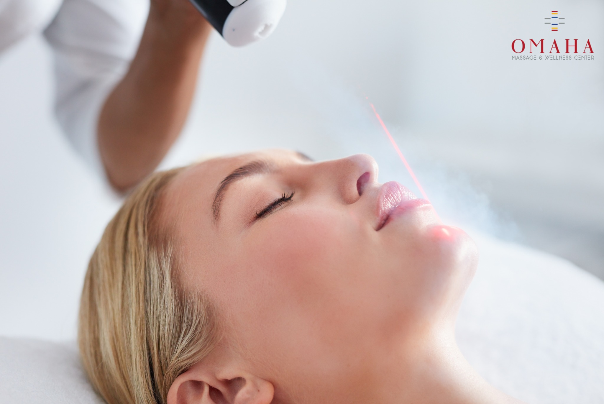 Client receiving Omaha cryotherapy facial treatment at Omaha Massage